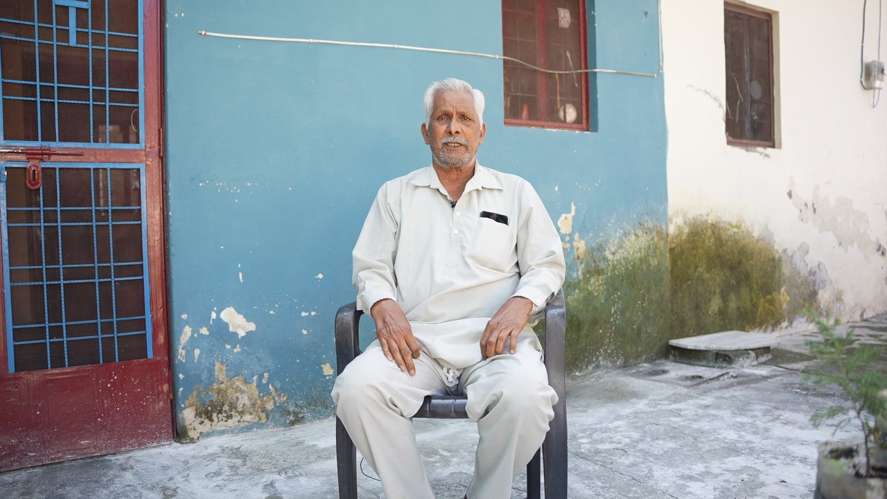 Om Prakash outside a building in Dehradun