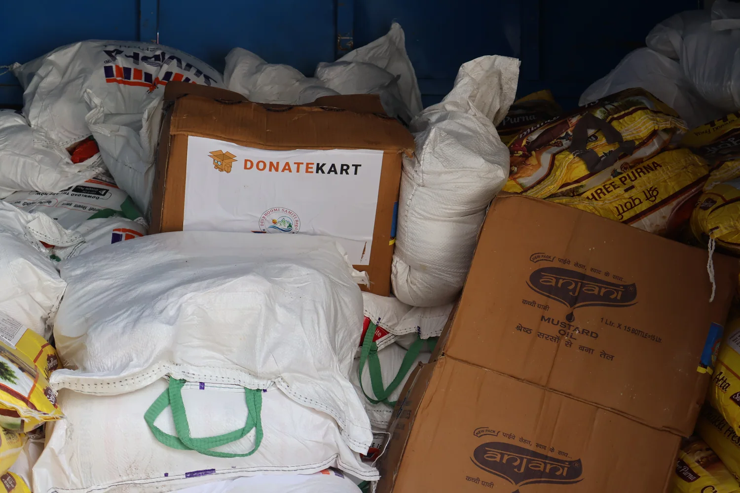 Ration sacks and cartons packed inside a relief vehicle.