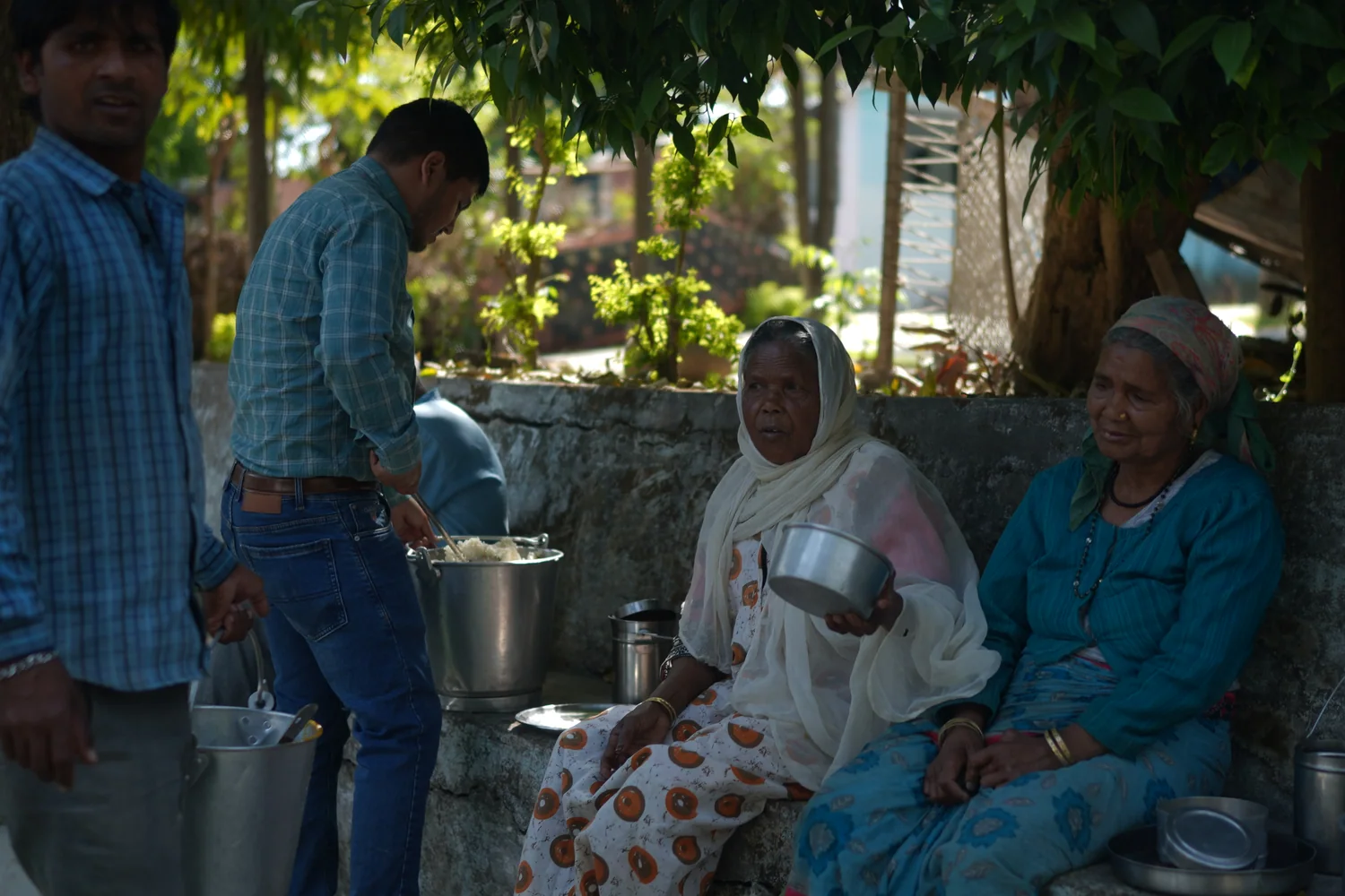 Food is served individually during the community meal.