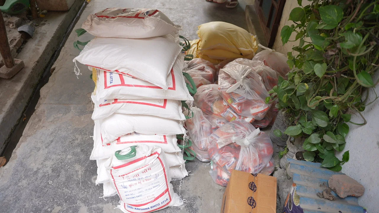 Sacks and packed items prepared for the neighbourhood visit.