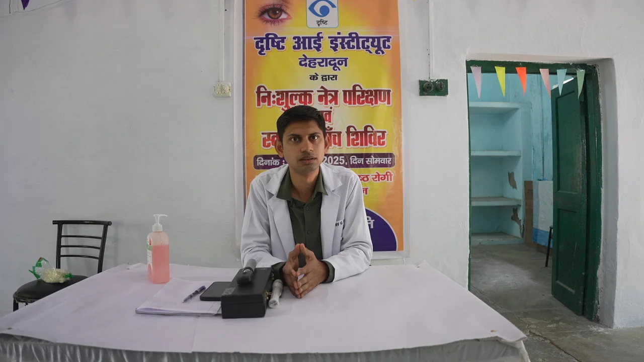 A consultation table and banner in the eye-care session space.