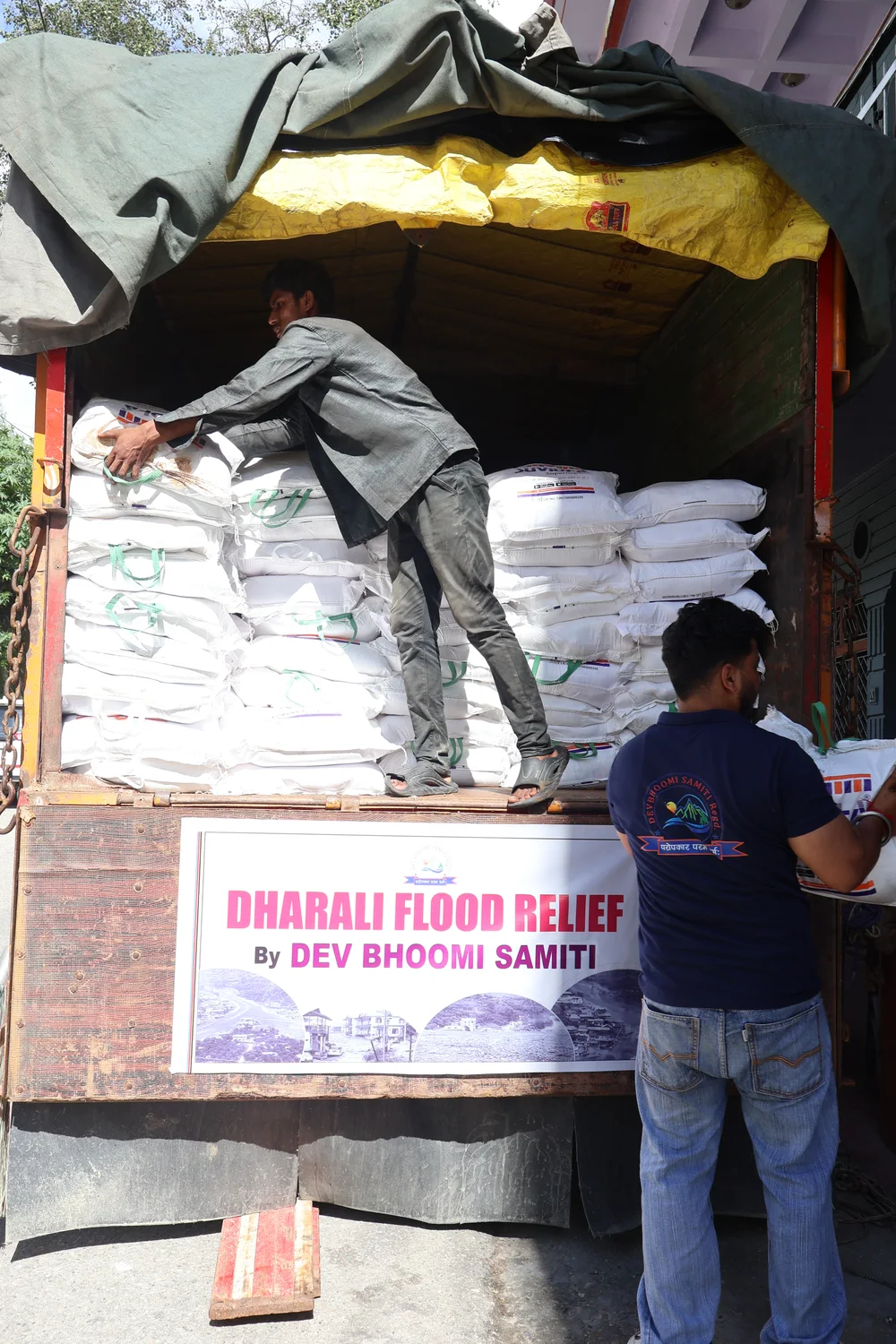 Packed sacks arranged inside a relief truck.