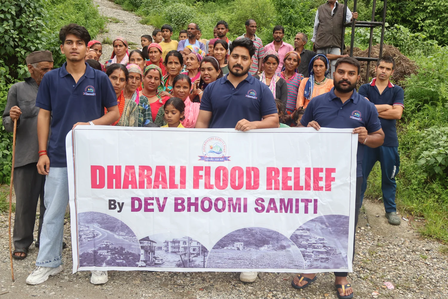 A group photograph from the Dharali relief collection.
