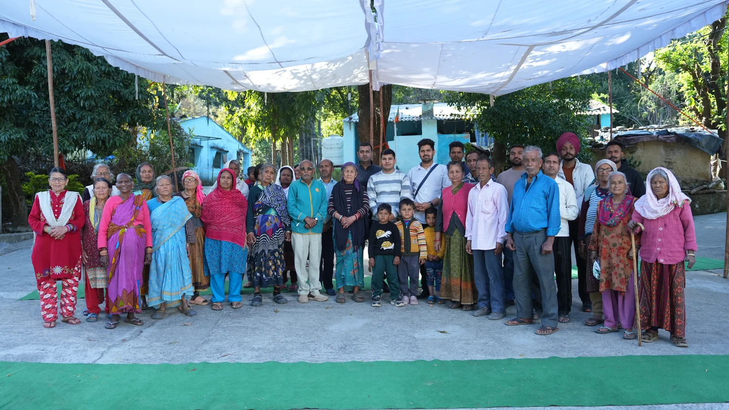 Residents and visitors gather for a community photograph.