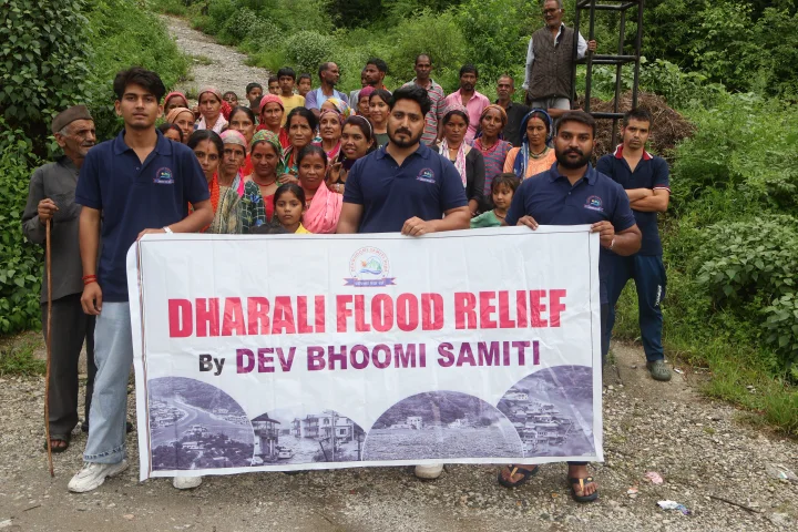 Dev Bhoomi Samiti relief team gathered with local community members